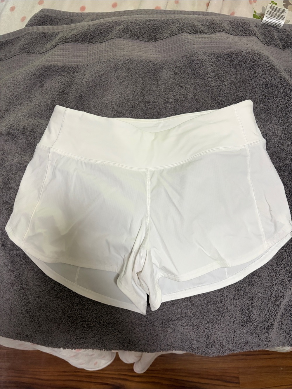 lululemon athletica White mid rise speedyp short lined 4 inch inseam